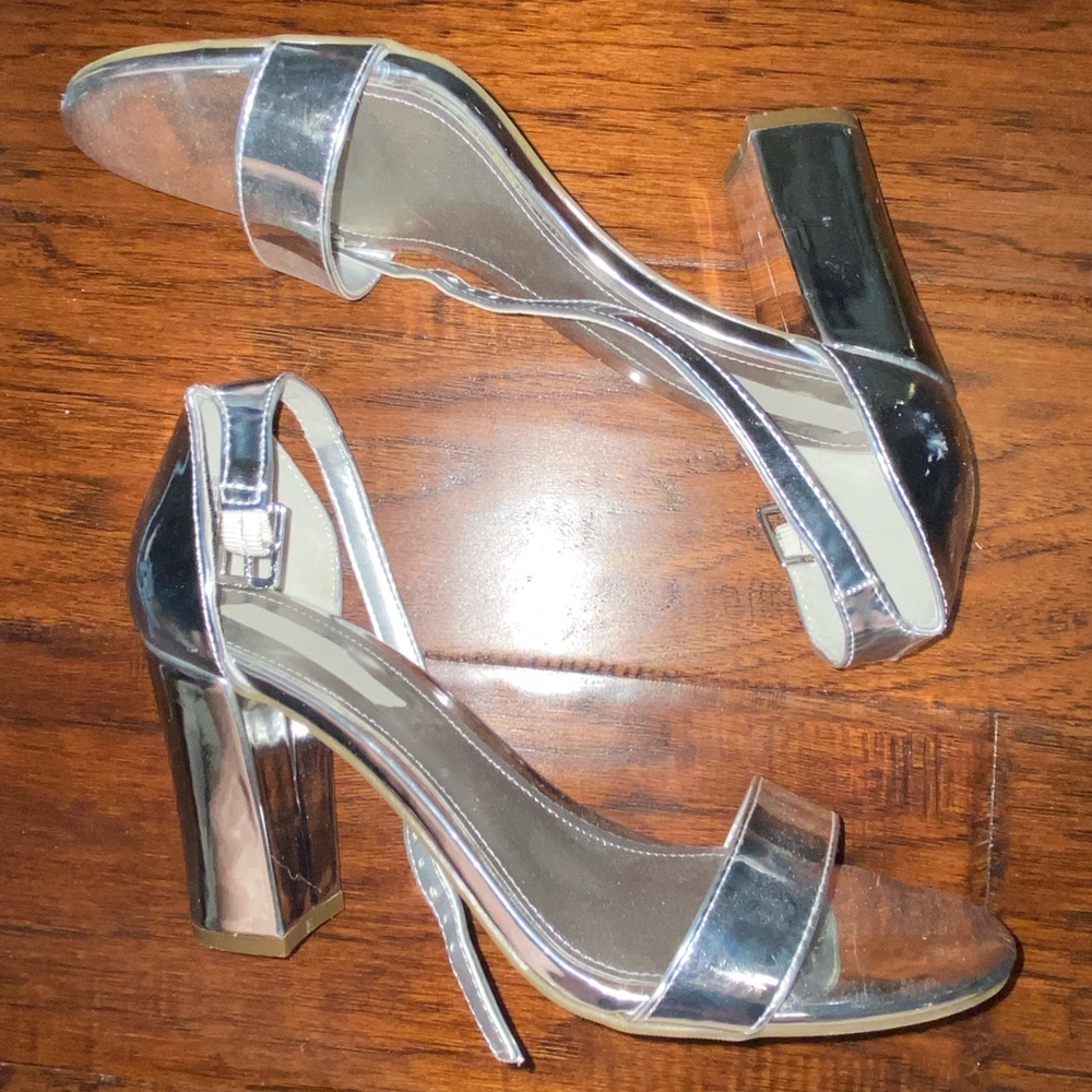 Silver high heals in women’s size 7